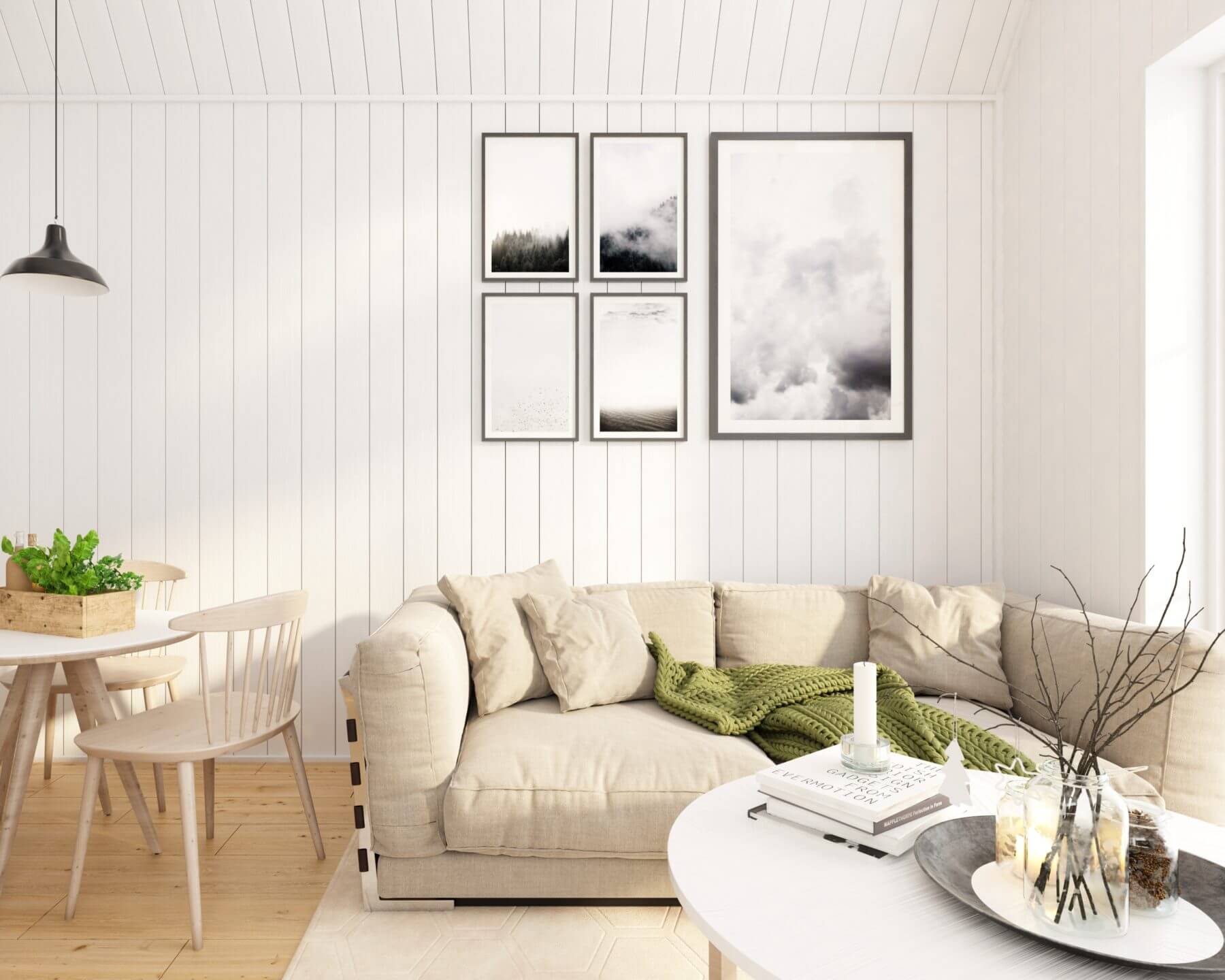 Vardagsrum med soffa och soffbord i attefallshus på 25 kvm med mansardtak och panoramafönster